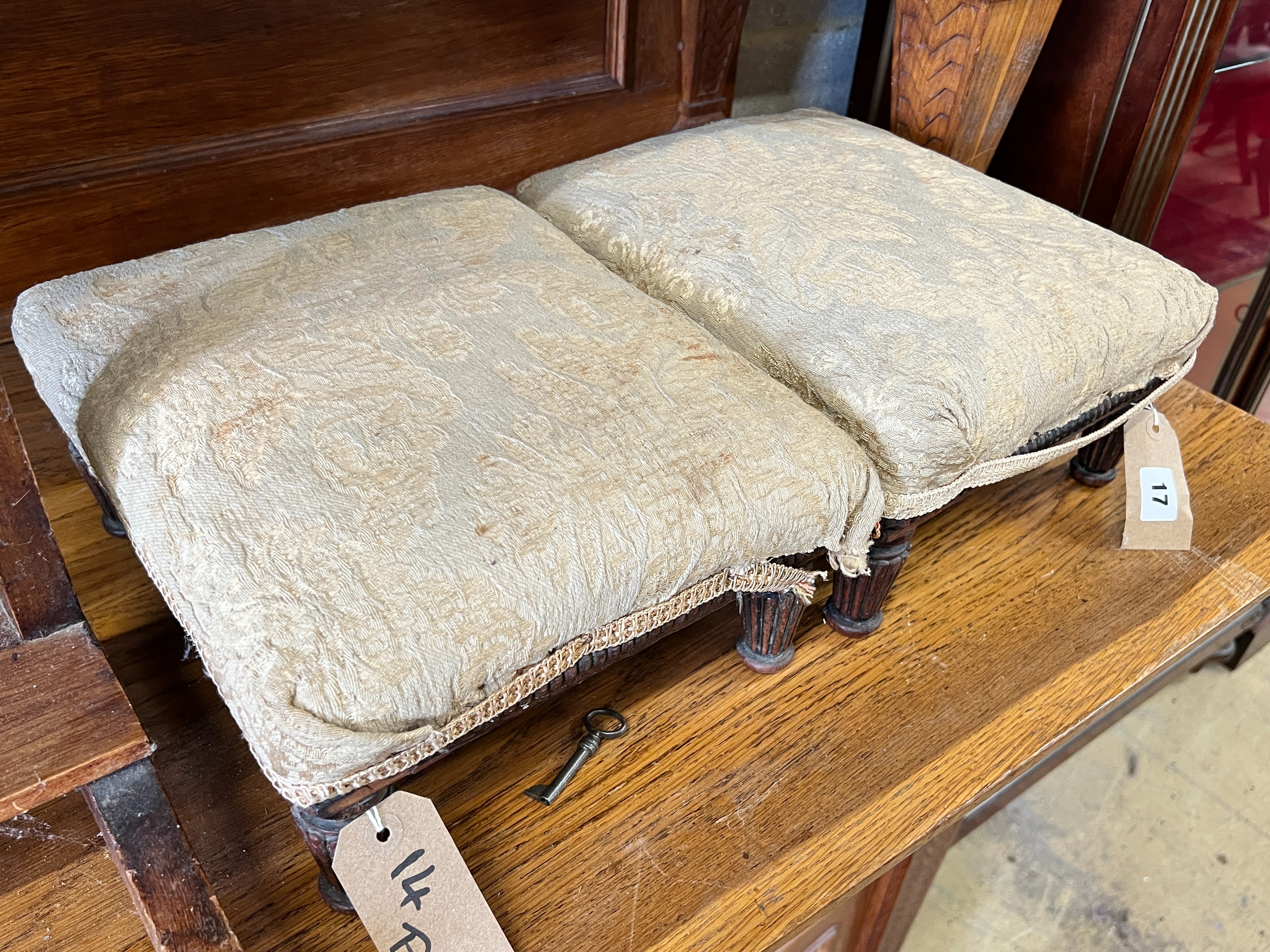 A pair of Victorian mahogany footstools, width 32cm, height 15cm